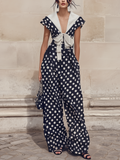 Navy Polka Dot Wide-Leg Jumpsuit With Sailor Collar & Bow Detail