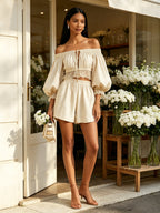 Beige Off-Shoulder Puff-Sleeve Two-Piece Set — Elegant Lace-Trimmed Cropped Top And High-Waisted Shorts Set
