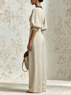 Elegant Beige Two-Piece Trouser Set For Women — V-Neck Puff-Sleeve Cropped Top And High-Waisted Wide-Leg Trousers