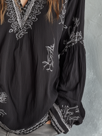 Elegant Black Embroidered V-Neck Blouse