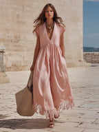 vacation style dusty pink deep v neck gathered waist fringe hem wide leg jumpsuit
